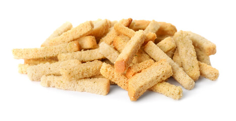 Heap of crispy rusks with seasoning on white background