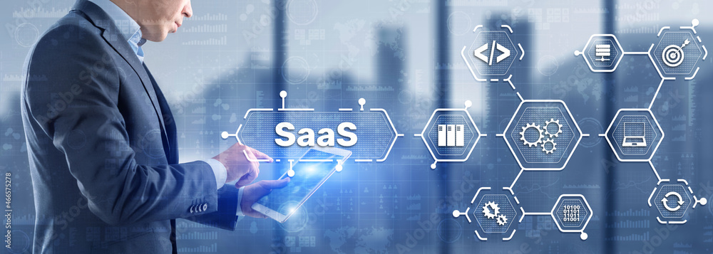 Poster saas software as a service concept with man hand pressing text