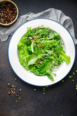 green salad leaves mix fresh herbs petals vitamin fresh meal snack on the table copy space food background rustic 