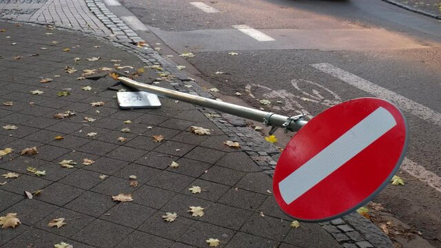 Street No Entry Sign on Broken Pole Damaged in Dangerous Car Accident