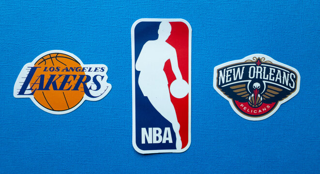 October 1, 2021, Springfield, USA, Emblems Of The Los Angeles Lakers And New Orleans Pelicans Basketball Teams On A Blue Background.