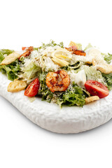 
salad on a plate on a white background