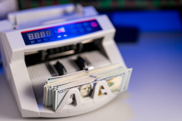 Cash electronic banking counter. Machine for counting money. Money and economics concept. Horizontal view