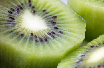 Naklejka na ściany i meble beautiful kiwi fruit closeup photograph