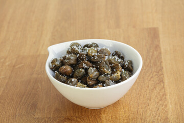 Salted marinated capers snack appetiser