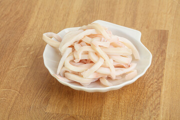 Marinated squid strips in the bowl