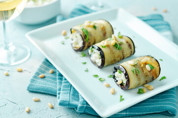 Rice pine nuts cilantro goat cheese stuffed eggplant rolls