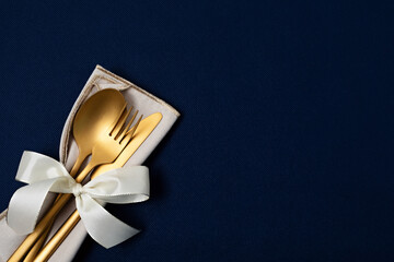 Festive christmas, wedding, birthday table setting with golden cutlery. Mockup for place card,...