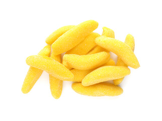 Pile with jelly candies in shape of banana on white background, top view