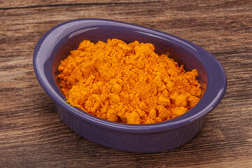 Tumeric powder in the bowl