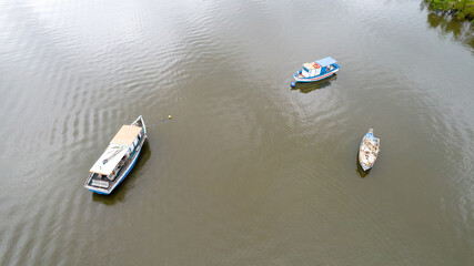 Mar Pequeno in Praia Grande São Paulo, Brazil. Aerial view of the bay with moored fishing boats and an island with vegetation