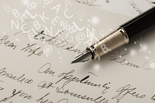 Fountain pen on an antique handwritten letter. Old history background. Retro style.