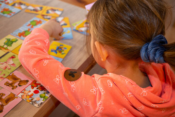 Symbol image: Child playing for language support in speech therapy (model released)