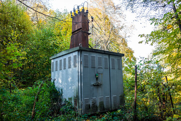 Electrical substation near summer cottages in the countryside, electrification of the village