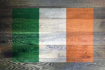 Ireland flag on rustic old wood surface background