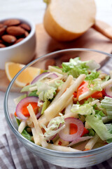 Delicious turnip salad served on table, closeup