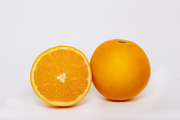 A piece and a half of a brazilian orange, laranja-bahia.