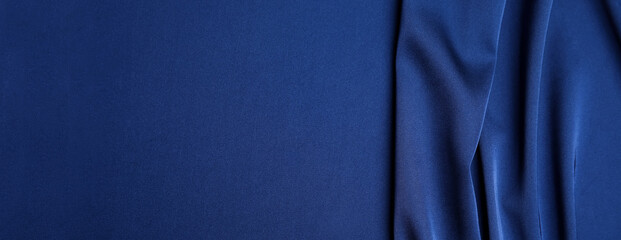 Dark blue silk fabric as background, top view with space for text. Banner design