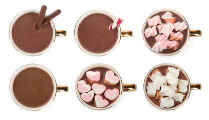Set with cups of delicious hot chocolate on white background, top view