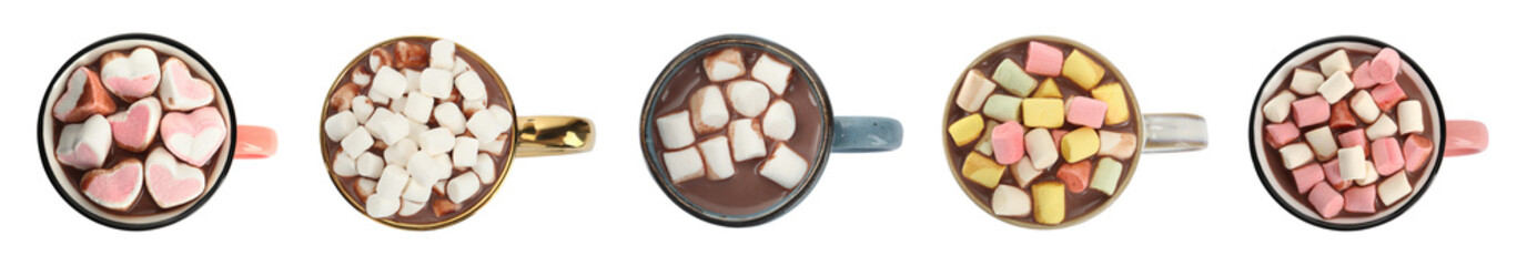 Set with cups of delicious hot chocolate on white background, top view. Banner design