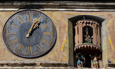 The clock in the tower of the medieval fortress from Sighisoara - Romania