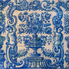 Traditional Portuguese, glazed ceramic tiles. Azulejos white, blue ornate pattern, for design, backdrop. Abstract background from old decorative painted tiles, religious theme with angels and flowers.