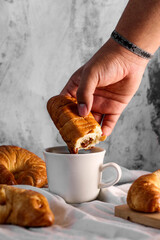 butter croissant with coffee, minimalist, breakfast. coffee shop