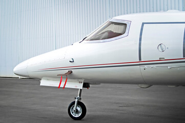white small business jet side view