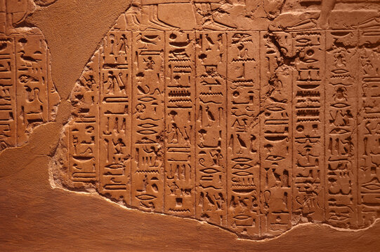 Archeology and Hieroglyphs - Photo of a mysterious inscription in the stone from ancient Egypt 