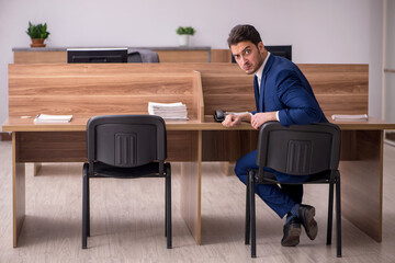 Young businessman employee working in the office