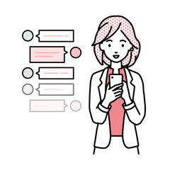 立ってスマートフォンで楽しくチャットで会話するジャケットの女性