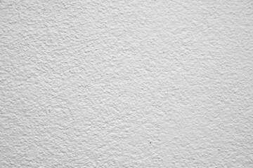 The rough surface of the wall or concrete floor is painted gray and white for the background.