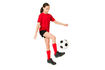 Skilled young girl doing a soccer trick