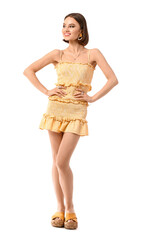 Happy woman with trendy jewelry on white background