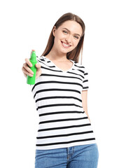 Young woman with mosquito repellent on white background