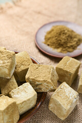 Plate with tasty hojicha marshmallows on table, closeup