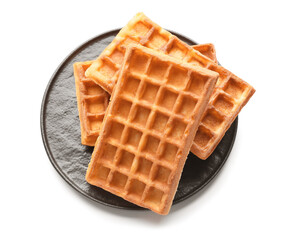 Plate with delicious Belgian waffles on white background