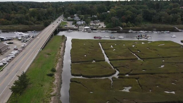 Aerial time lapse of vehicles over bridge on Route 3A over North River in seacoast town of Scituate.