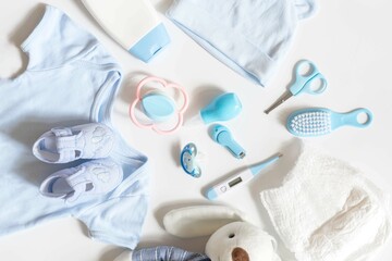 childhood and Childcare concept - Simple tools for baby, diaper, lotion, thermometer, aspirator...