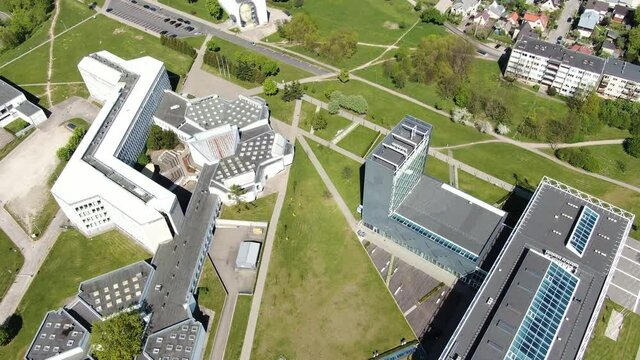 Modern student campus and university buildings of KTU in Kaunas city, aerial orbit view