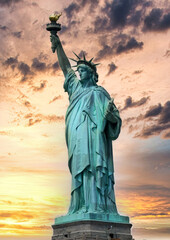 Statue of Liberty with colorful sunset sky