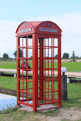 telephone booth with blue sky