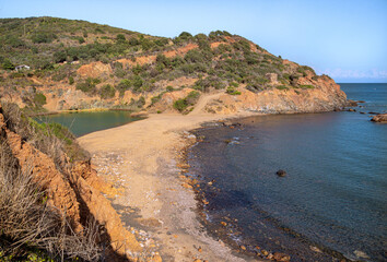 beach and lake (laghetto) of terranera,  a natural bay with black sand and free public beach near...