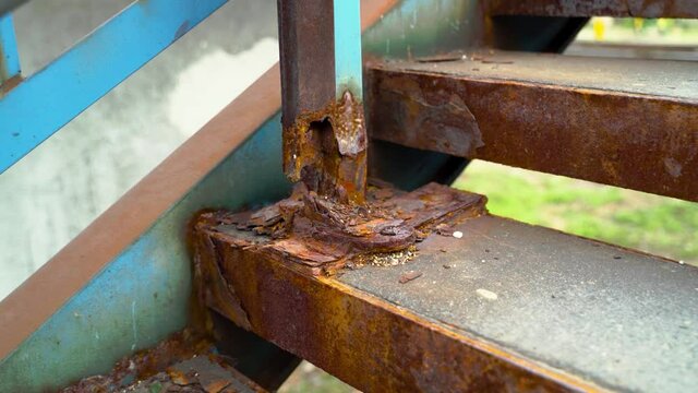 Extremely rusty stairs in Eastern Europe, close-up