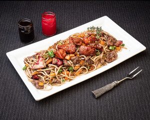 pasta with vegetables and bbq ribs