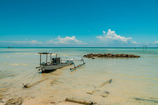 Beach With Rows Of Coconut And White Sand That Spoil The Eyes Of Tourists