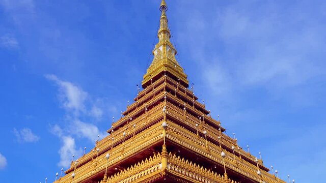 Golden ancient pagoda of Phra Mahathat Kaen Nakhon (Wat Nong Wang) temple, Thai traditional religious histoty travel attraction in Khon Kaen, Thailand.