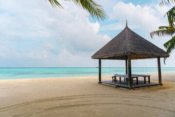 A beach on one of the islands in the Maldives archipelago that is really calm and clean, perfect for holidays