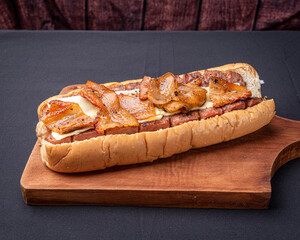 hot dog on wooden board