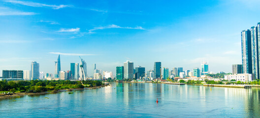 Aerial view of center Ho Chi Minh City, Vietnam with Bitexco Financial tower, Thu Thiem 2 bridge,...